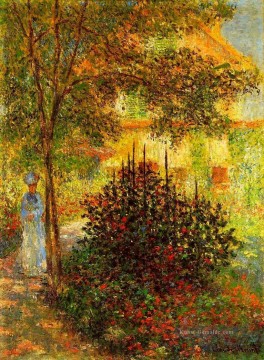  garten - Camille Monet im Garten am Haus in Argenteuil Claude Monet